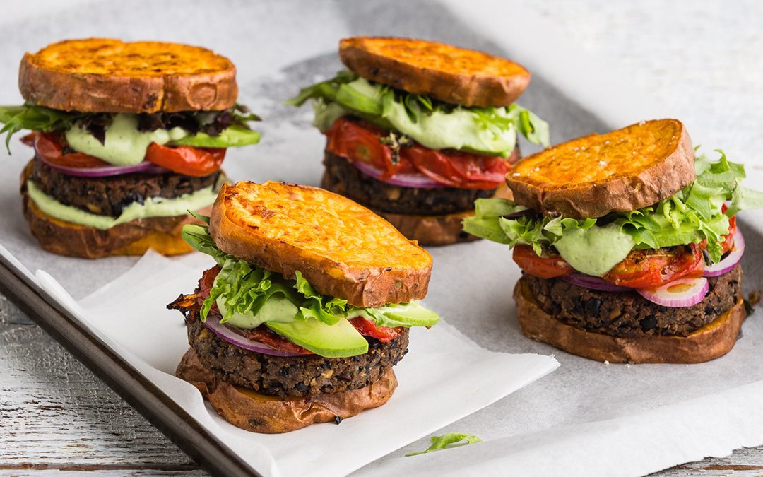 Black Bean Burgers with Kumara ‘Buns’, Oven-Roasted Tomatoes & Rocket