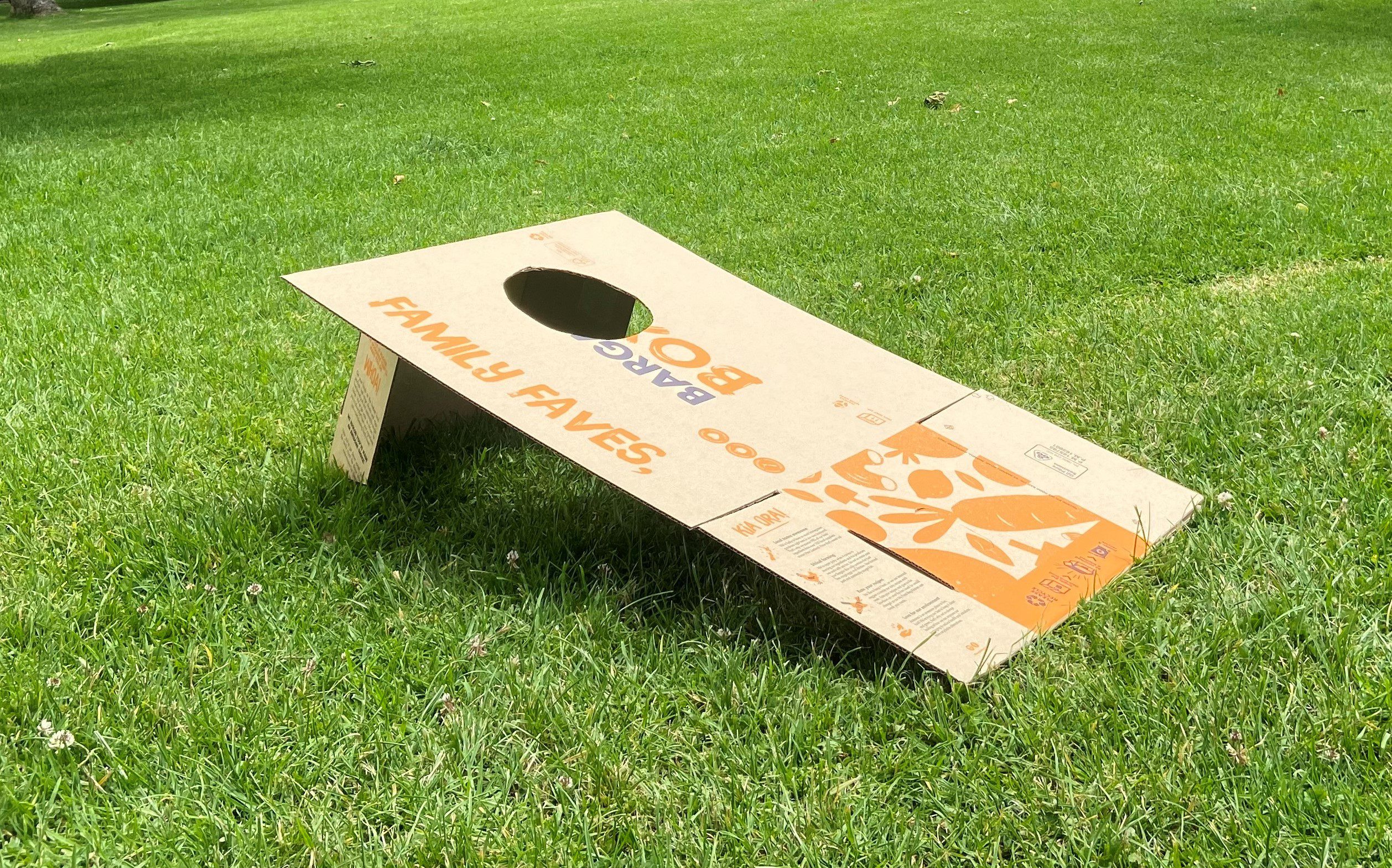 A cornhole target made from a Bargain Box.