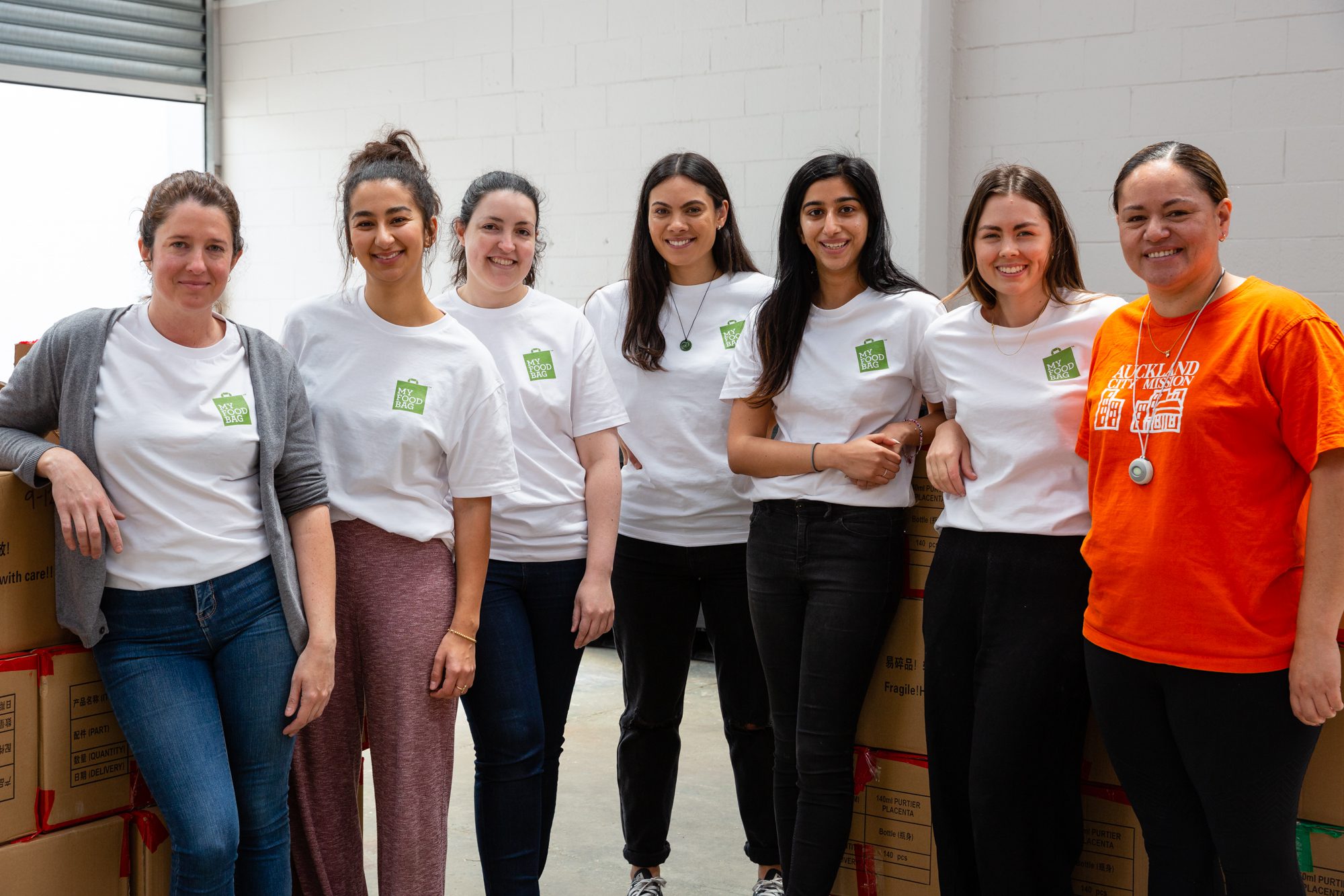 A team from My Food Bag volunteer at Auckland City Mission box packing.