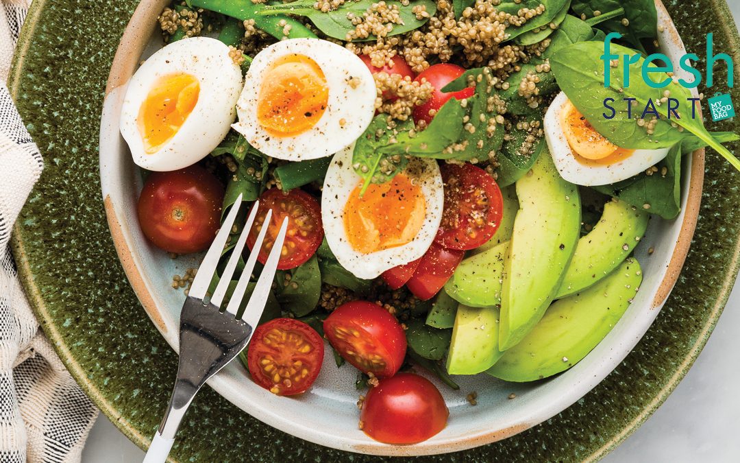 Quinoa breakfast bowls with boiled eggs