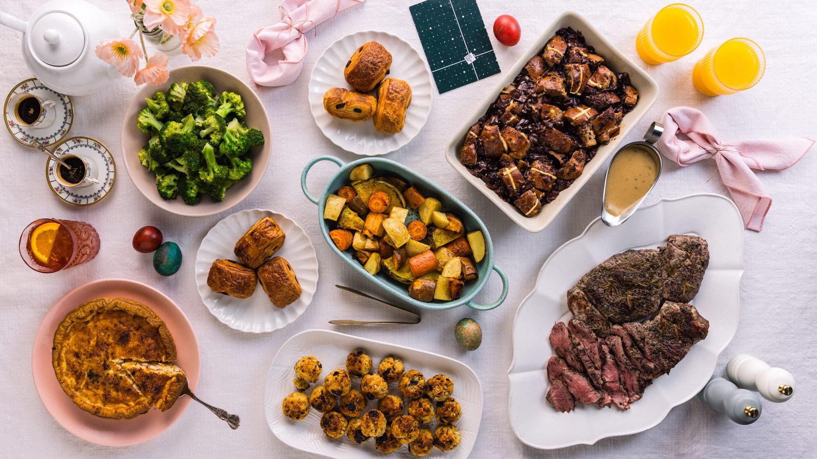 Easter long weekend dinner with lamb, stuffing balls, vegetables, pasties and pudding.